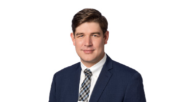 Headshot of J.J Bennett
