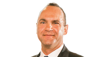 Headshot of John M. Howell